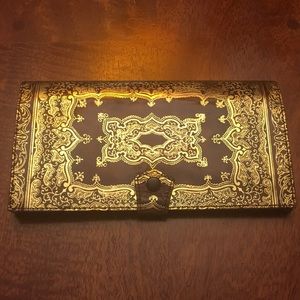 Ornate vintage leather wallet with change purse